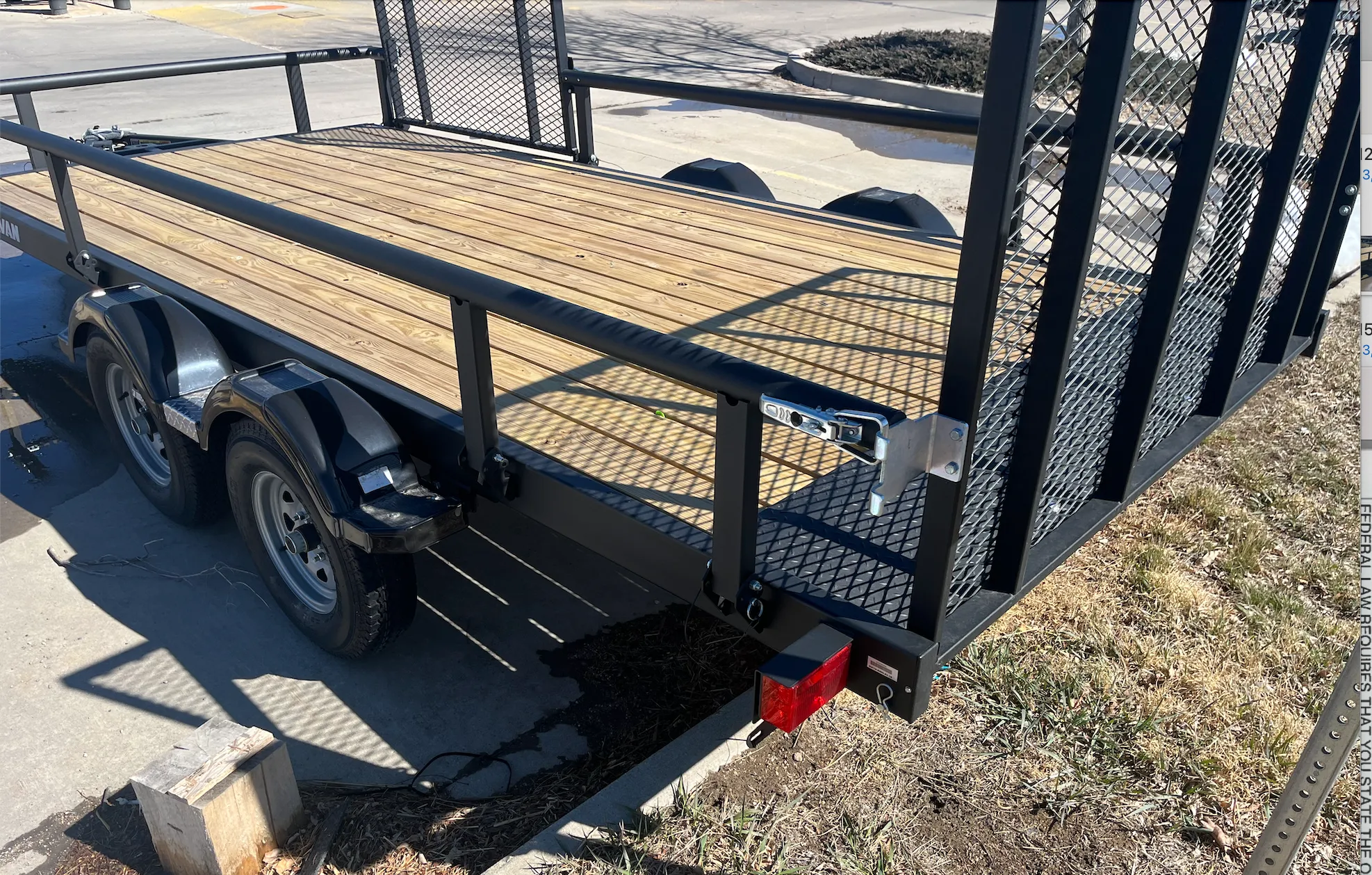 7x15 Karavan dual axe trailer with side ramp