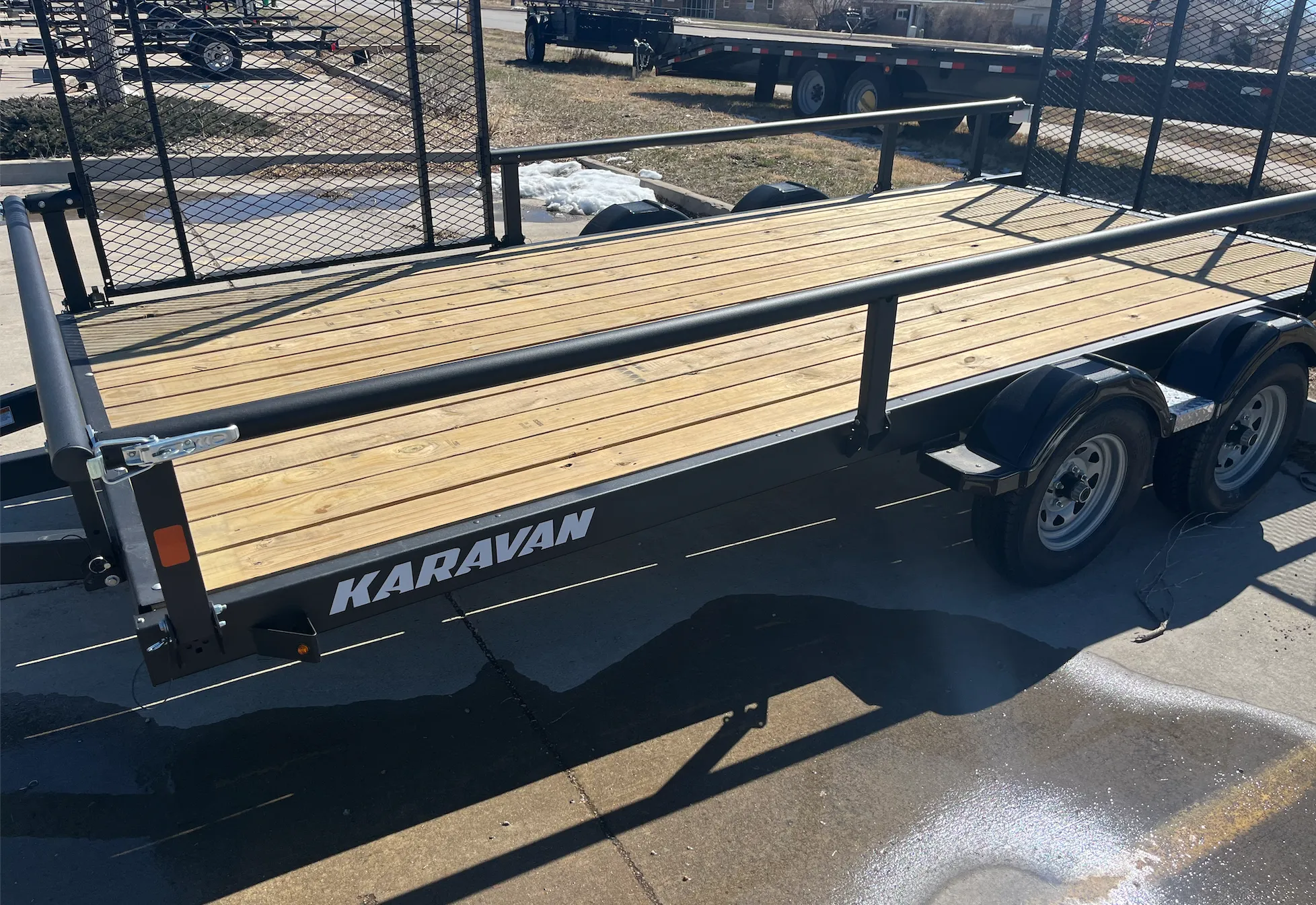 7x15 Karavan dual axe trailer with side ramp